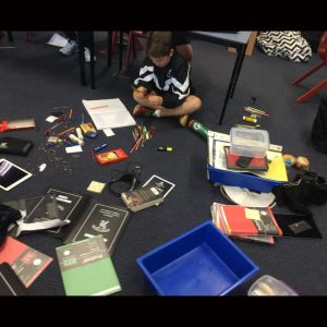 Examining Contents of School Bag cropped